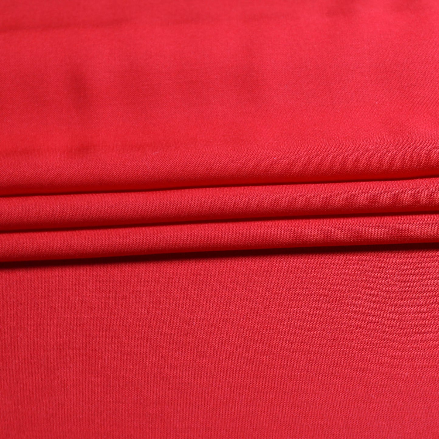 folded viscose challis fabric red colour for dressmaking