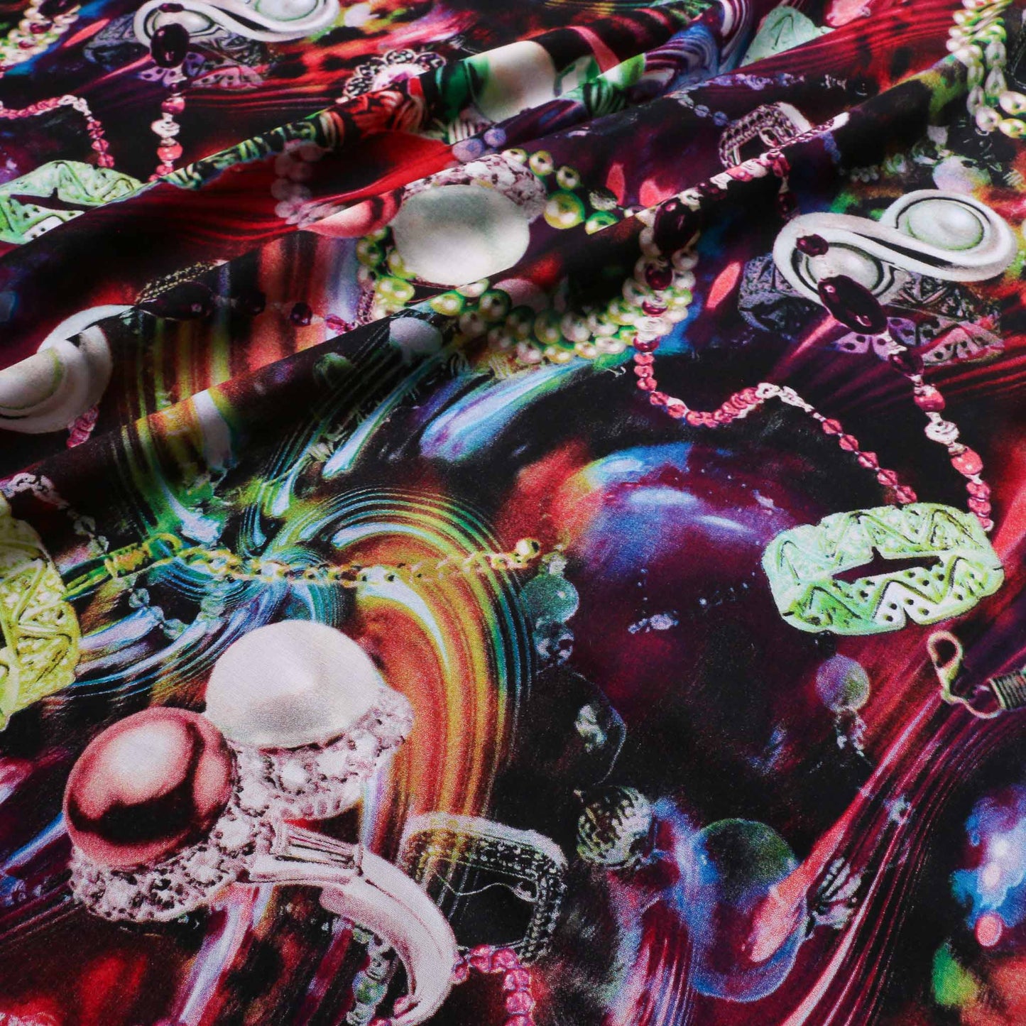 striking viscose challis dressmaking fabric with multicoloured jewellery designed print