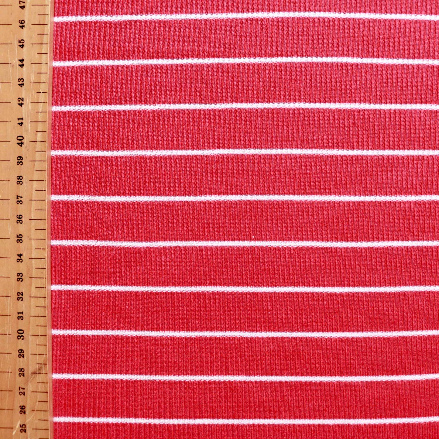 rib jersey knit stretchy viscose dressmaking fabric in red and white stripe
