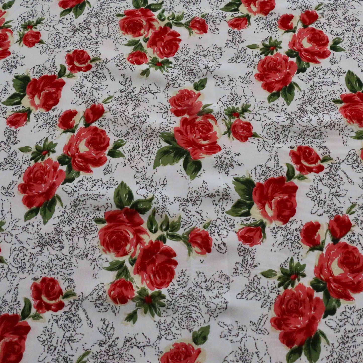 red rose printed flower on white stretchy chiffon polyester dressmaking fabric