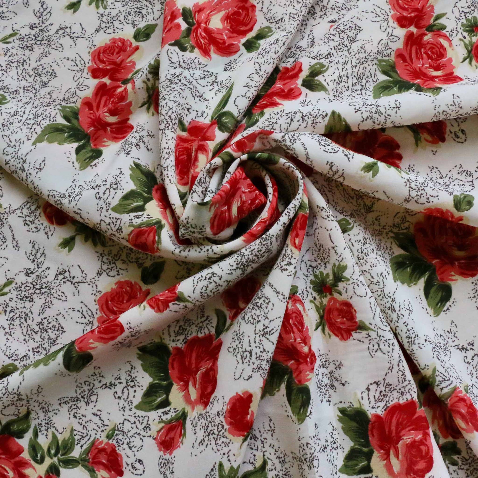 red rose floral print on stretchy white polyester chiffon dressmaking fabric