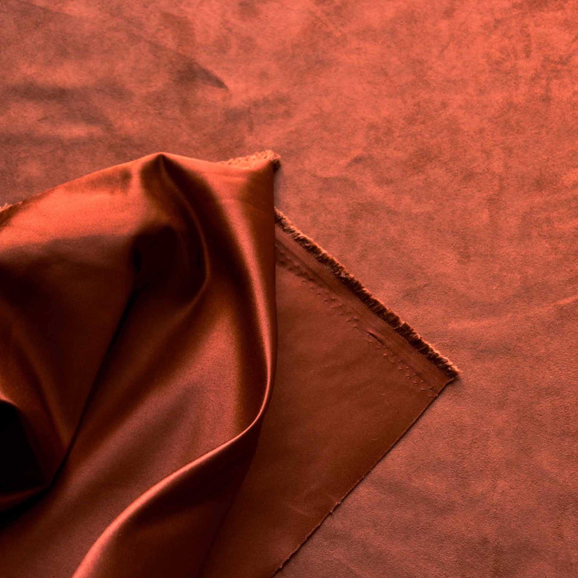 rust orange faux suede dressmaking suedette fabric with satin back