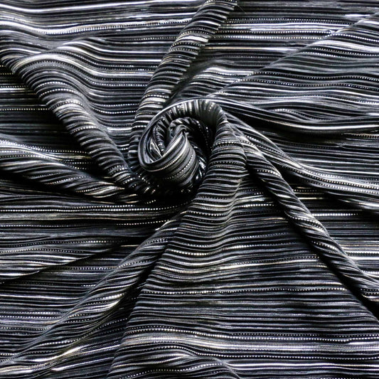silver and black pleated plisse dressmaking fabric