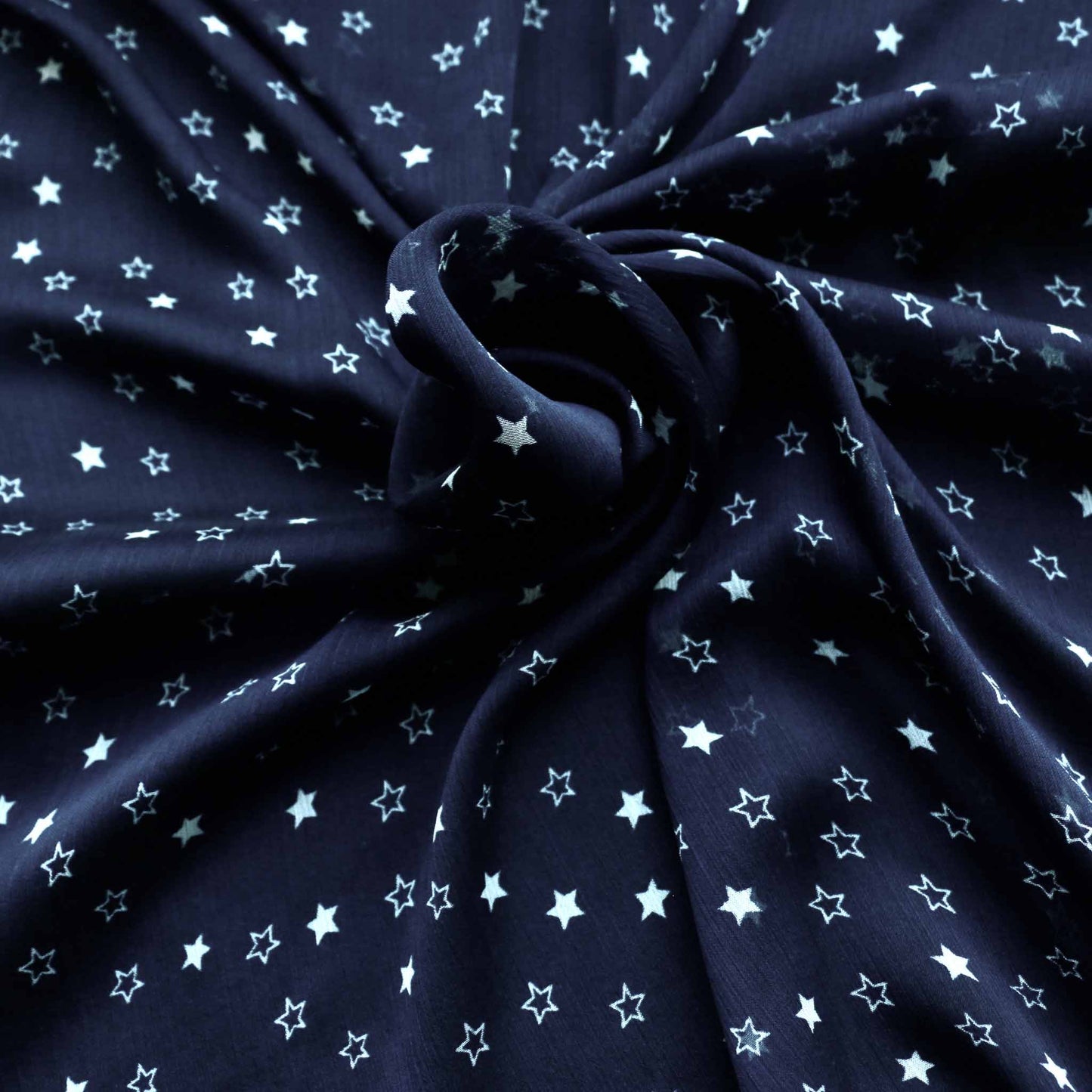 white and blue chiffon crinkle polyester dressmaking fabric in blue and white