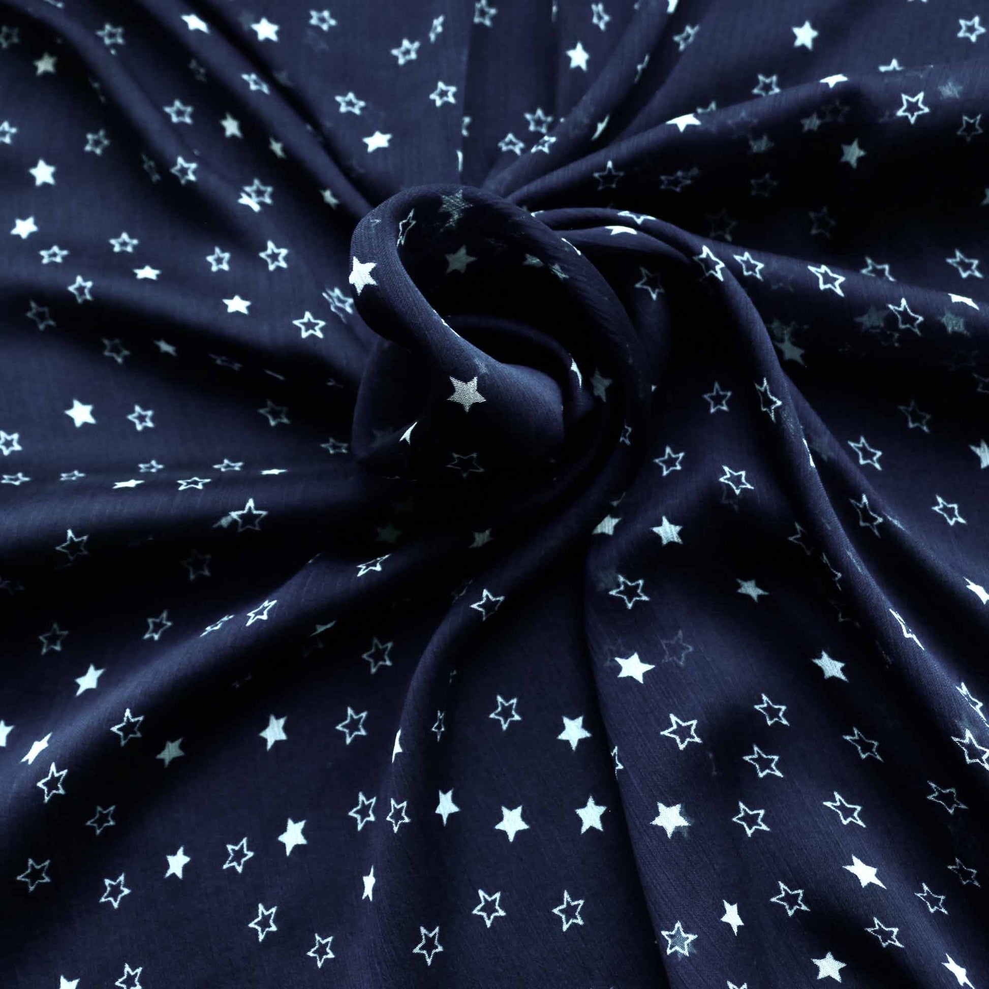 white and blue chiffon crinkle polyester dressmaking fabric in blue and white