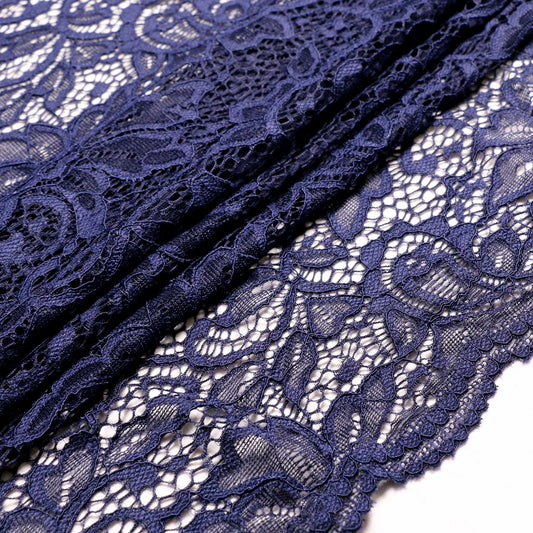 corded lace dressmaking fabric in blue with scalloped edge