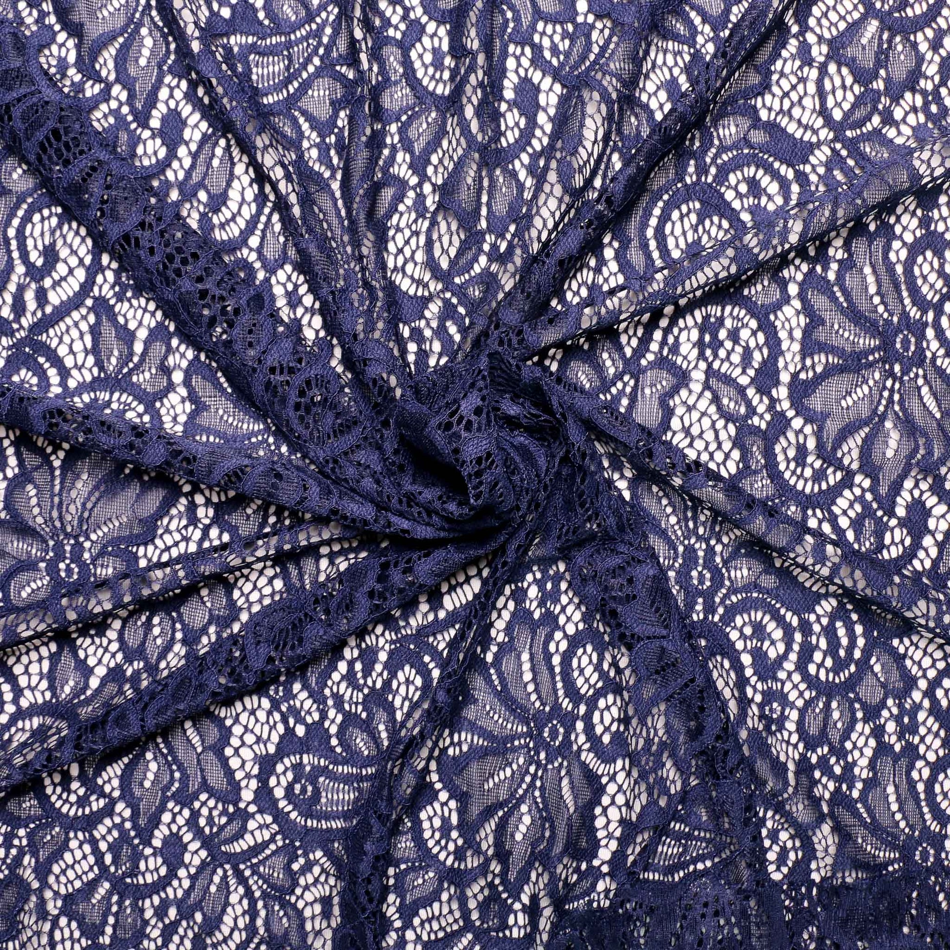 blue corded lace dressmaking fabric with scalloped edge