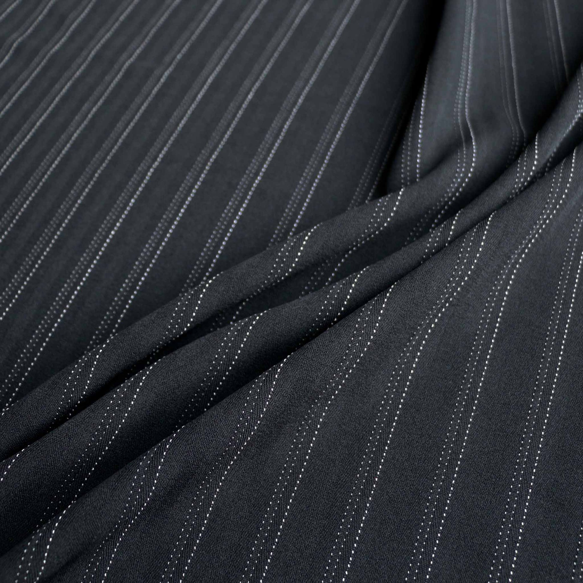 stretchy black suiting synthetic fabric with dotted white pinstripe