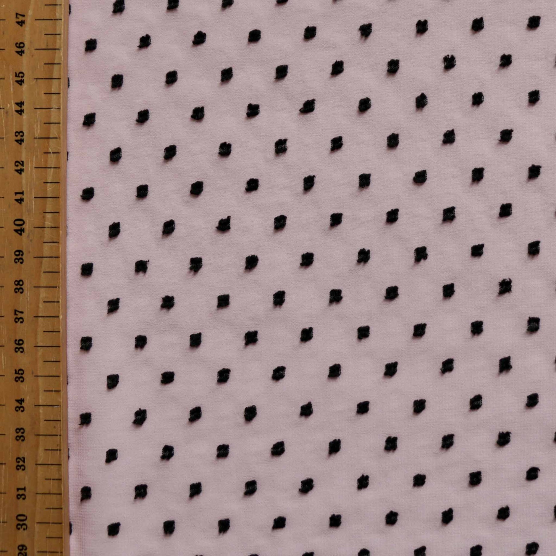 metre pink swiss dot with black dobby dressmaking fabric