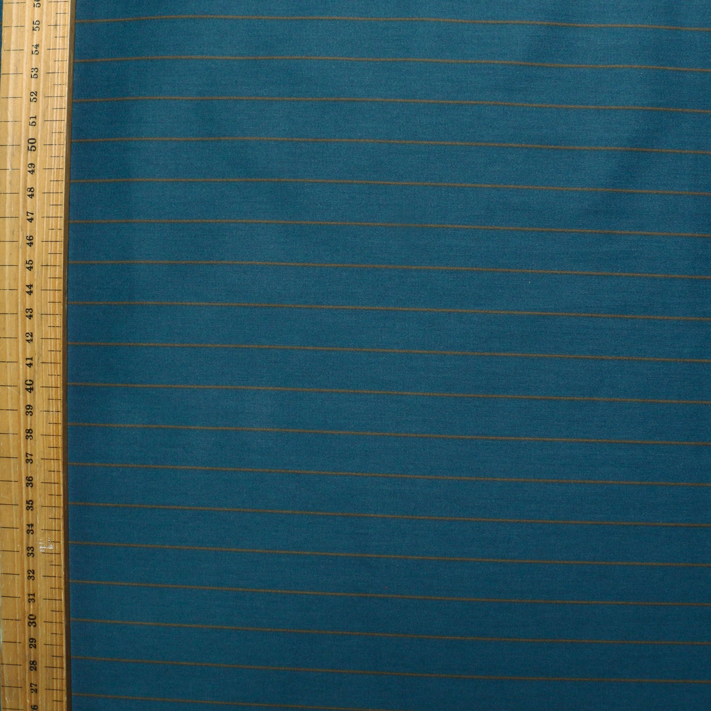 metre cotton pinstripe dressmaking fabric in teal and beige