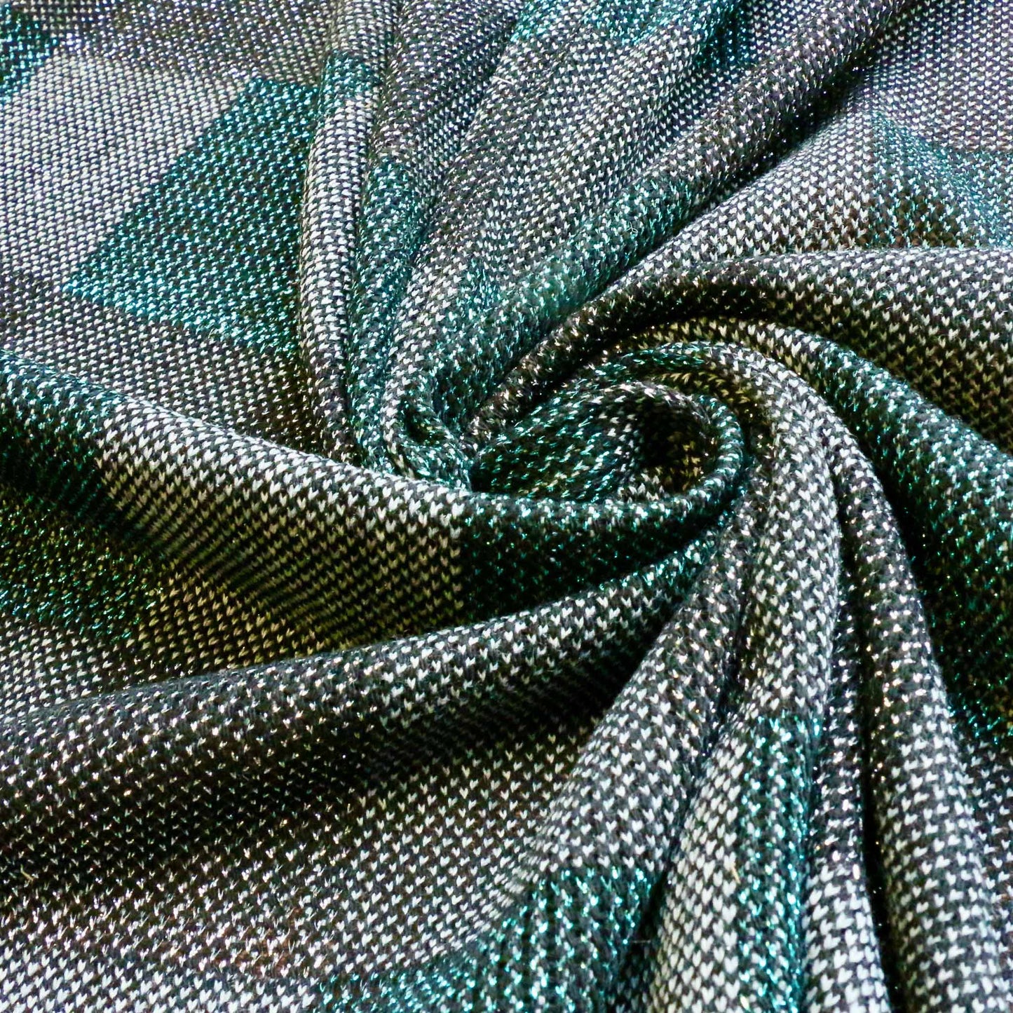 jersey knit dressmaking fabric with turquoise and black check pattern