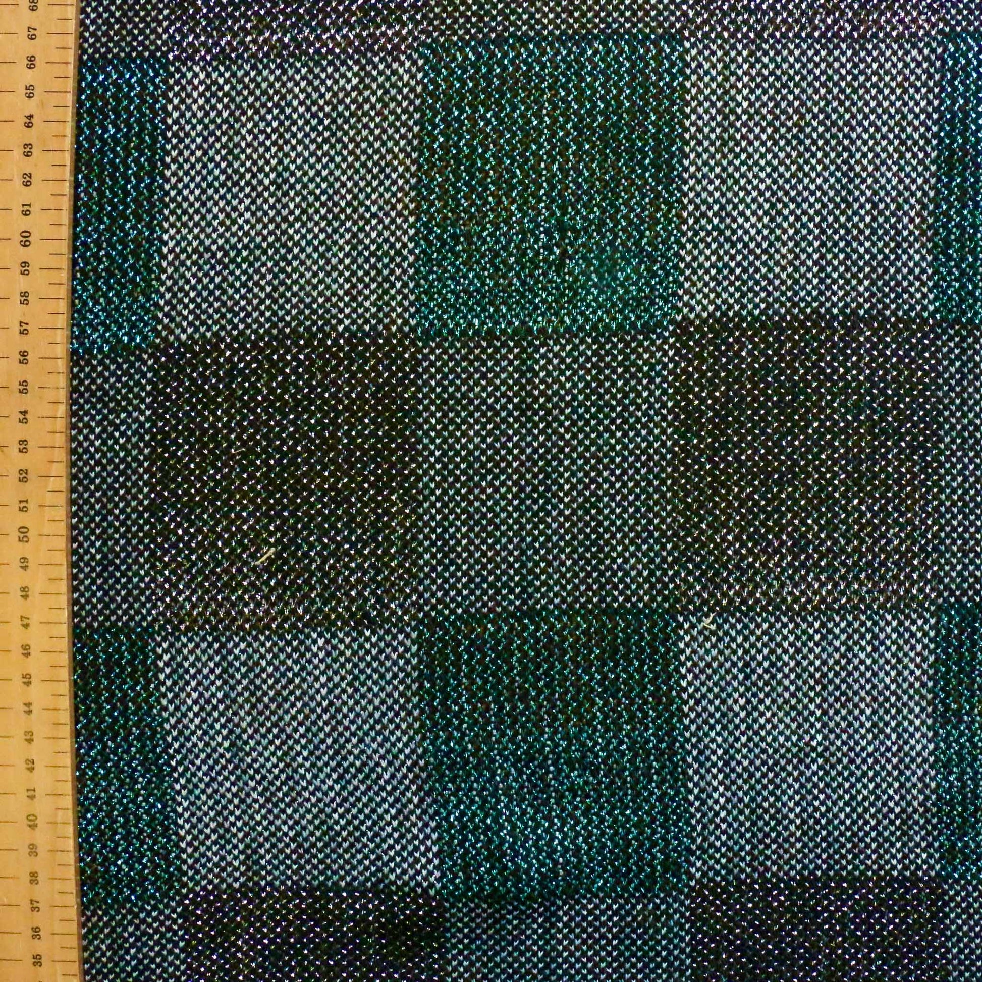 metre deadstock jersey knit dressmaking fabric with turquoise and black check pattern