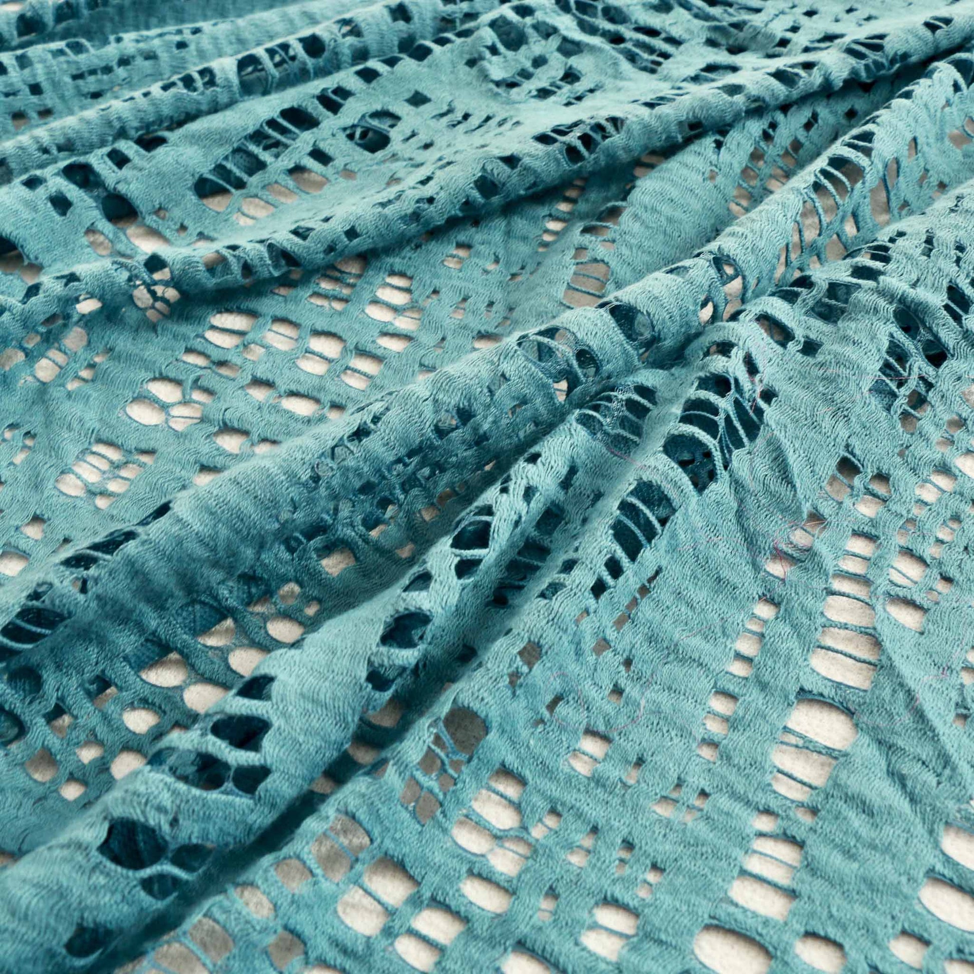 embroidery dressmaking lace fabric in turquoise colour with abstract design
