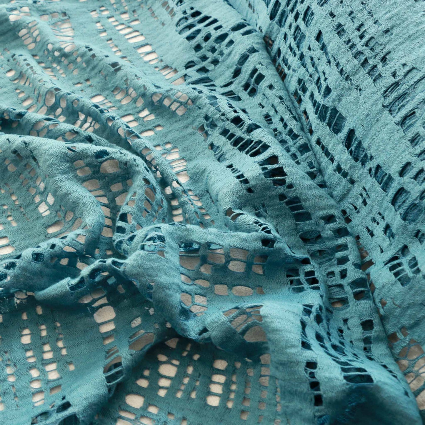 embroidery lace fabric for dressmaking with abstract pattern in turquoise colour