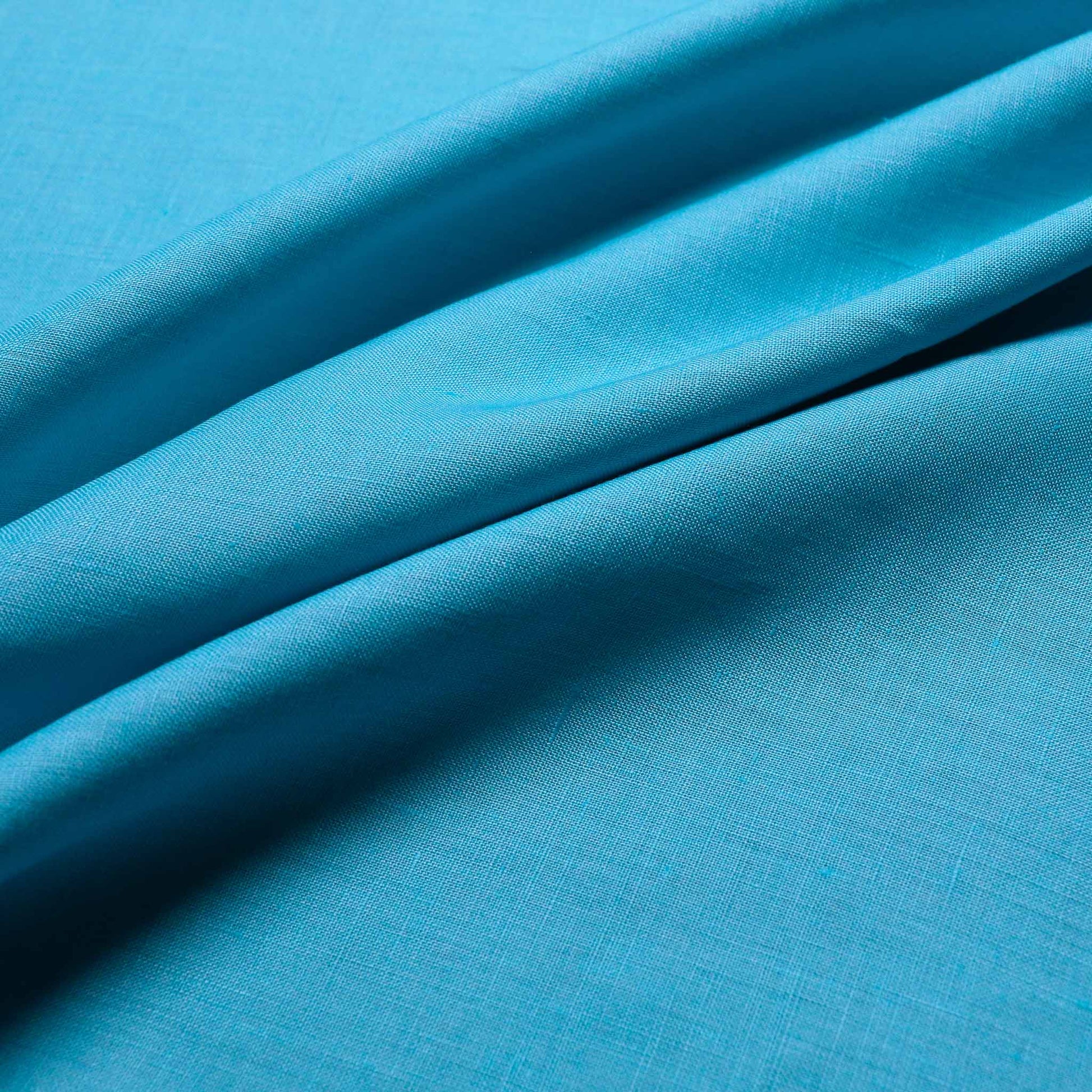 plain pastel teal linen cotton dressmaking fabric