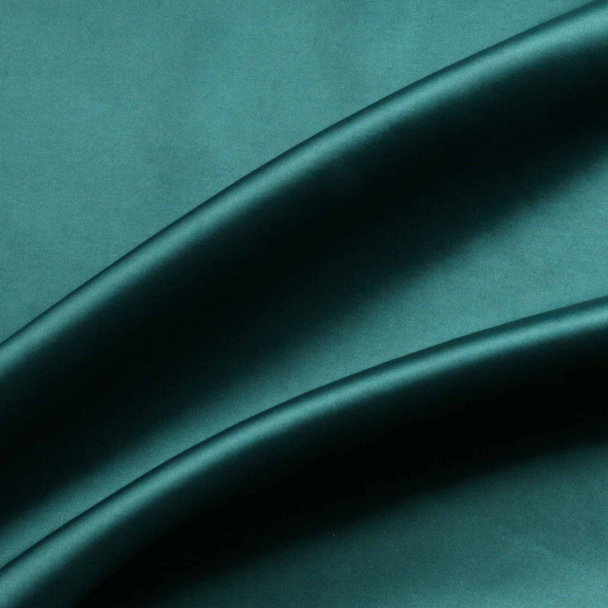 stretchy dressmaking lining fabric in teal and turquoise colour