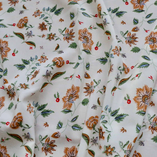 white chiffon dressmaking fabric with brown floral flower print