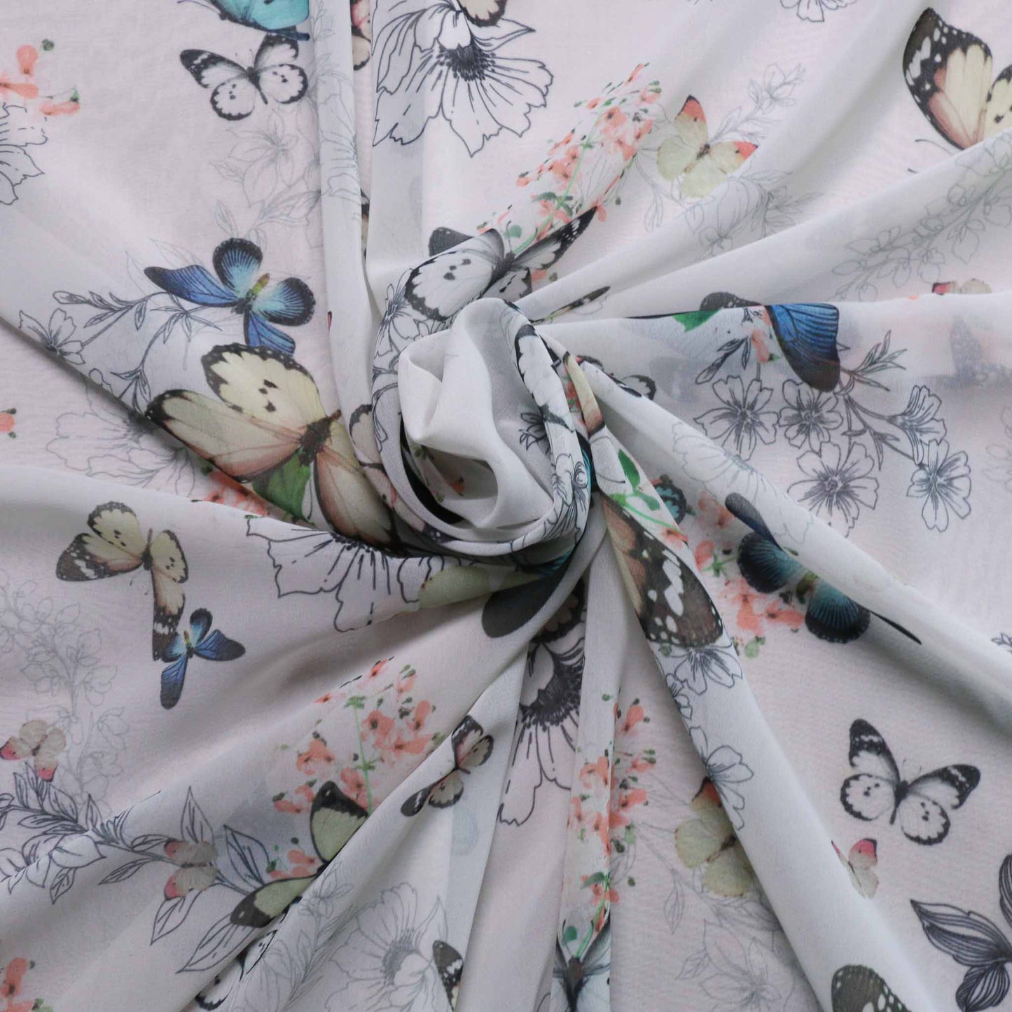 butterfly printed chiffon dressmaking fabric in white and blue