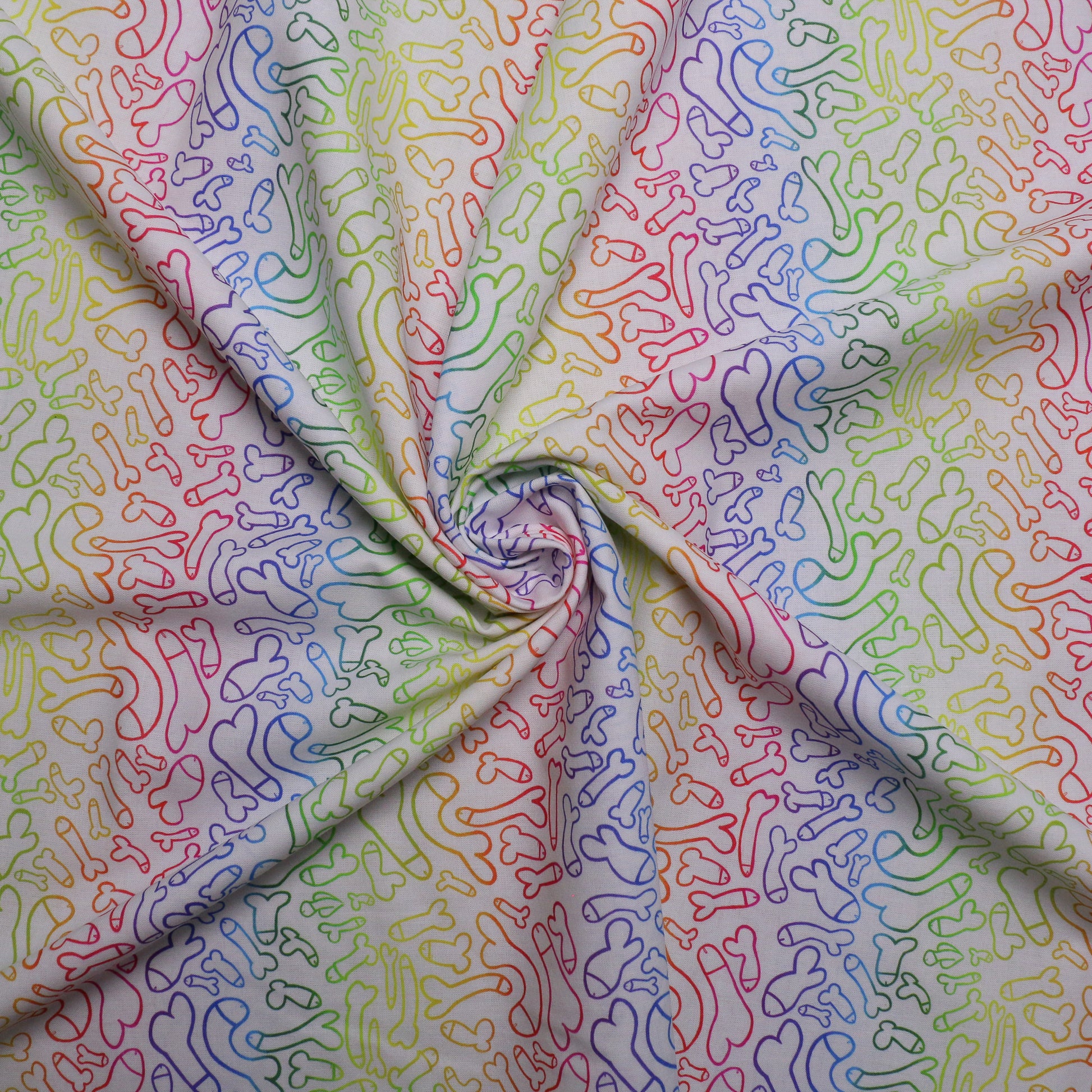 rainbow coloured cotton dressmaking poplin fabric with cheeky willy print