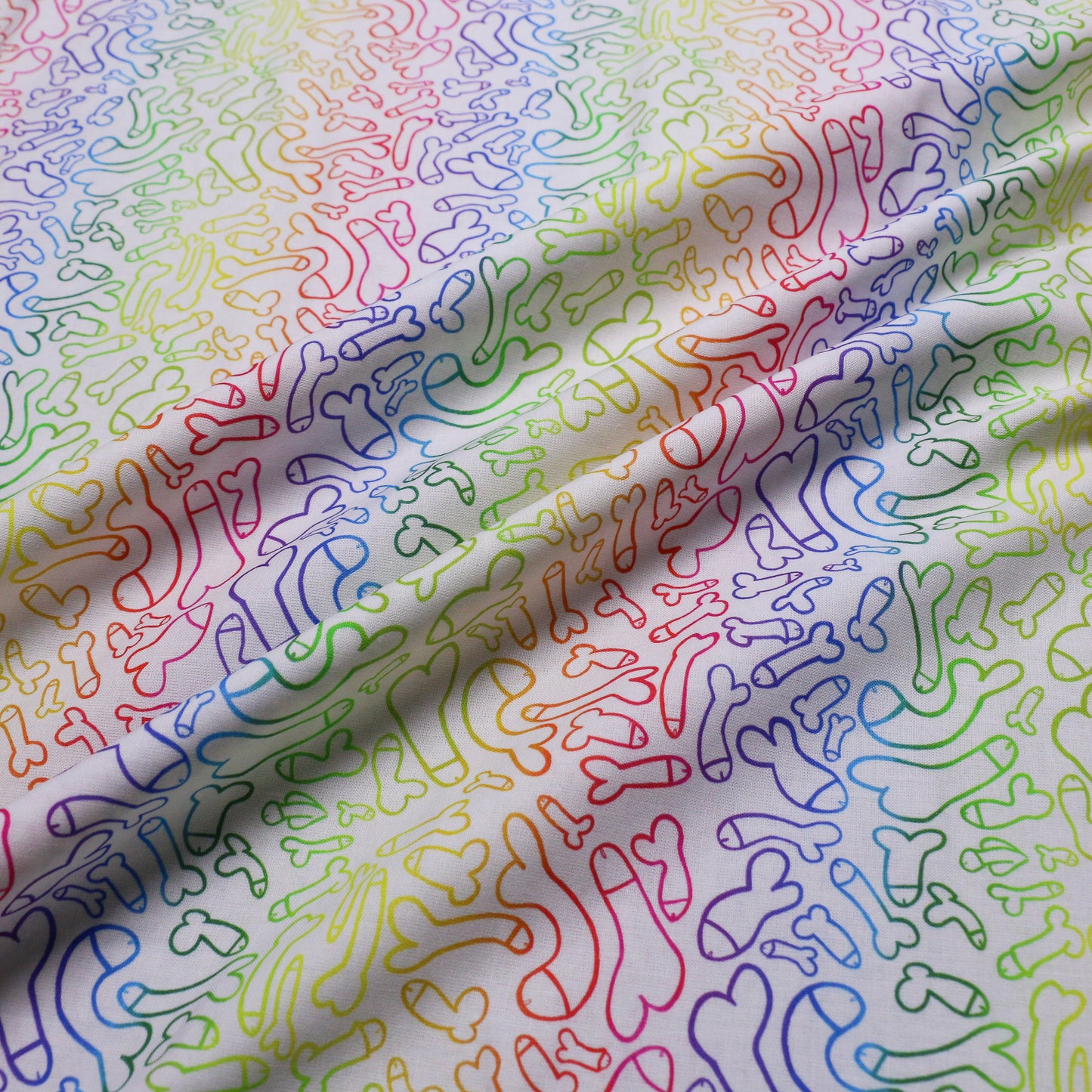 pure cotton dressmaking fabric with multicoloured penis print