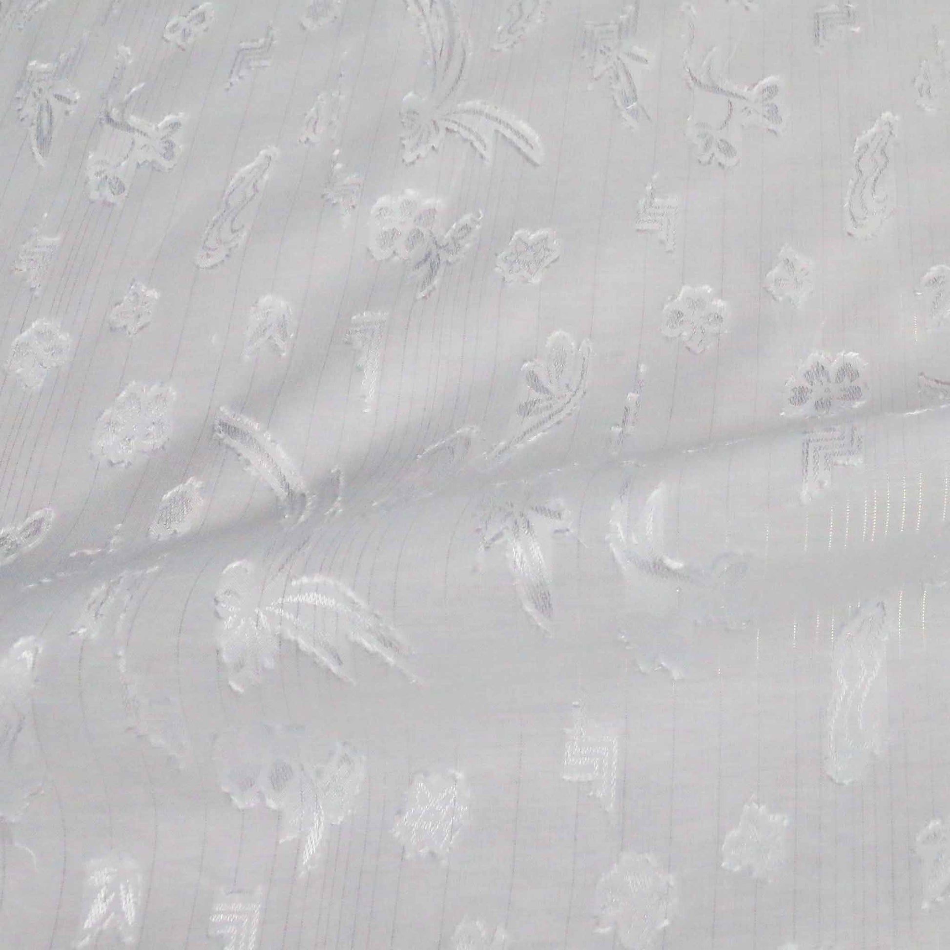 flocked and clipped floral design on white polycotton dressmaking fabric with silver stripe