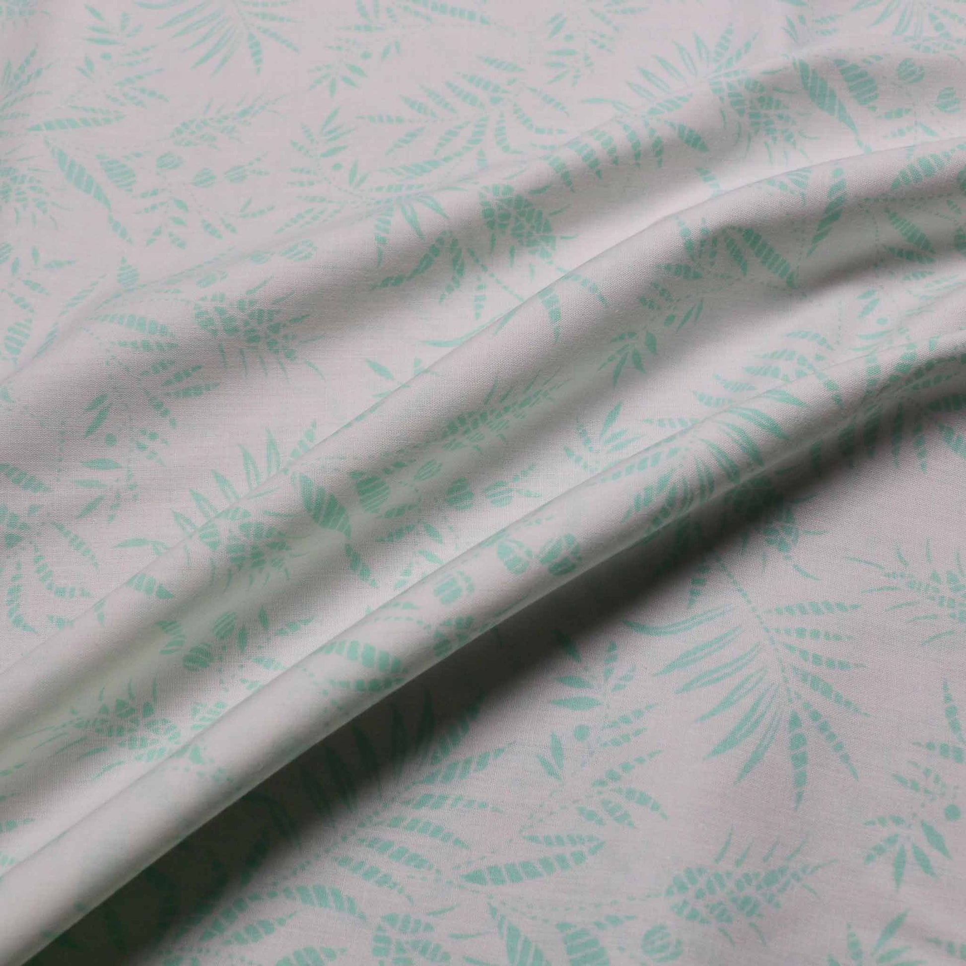 polycotton dressmaking fabric with leaves print