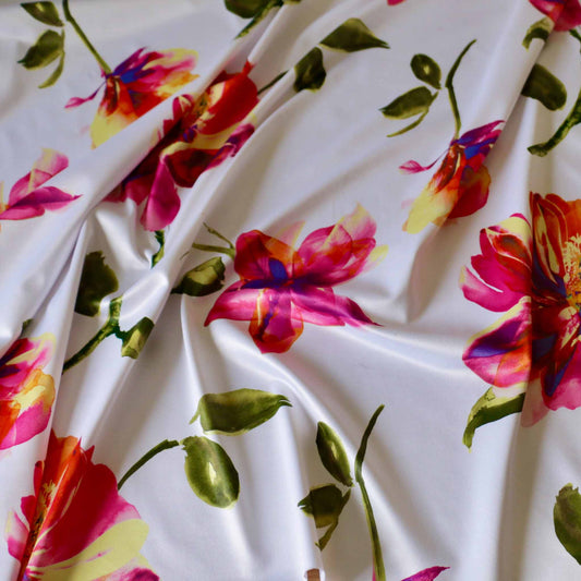white lycra jersey dressmaking fabric with magnolia flower print