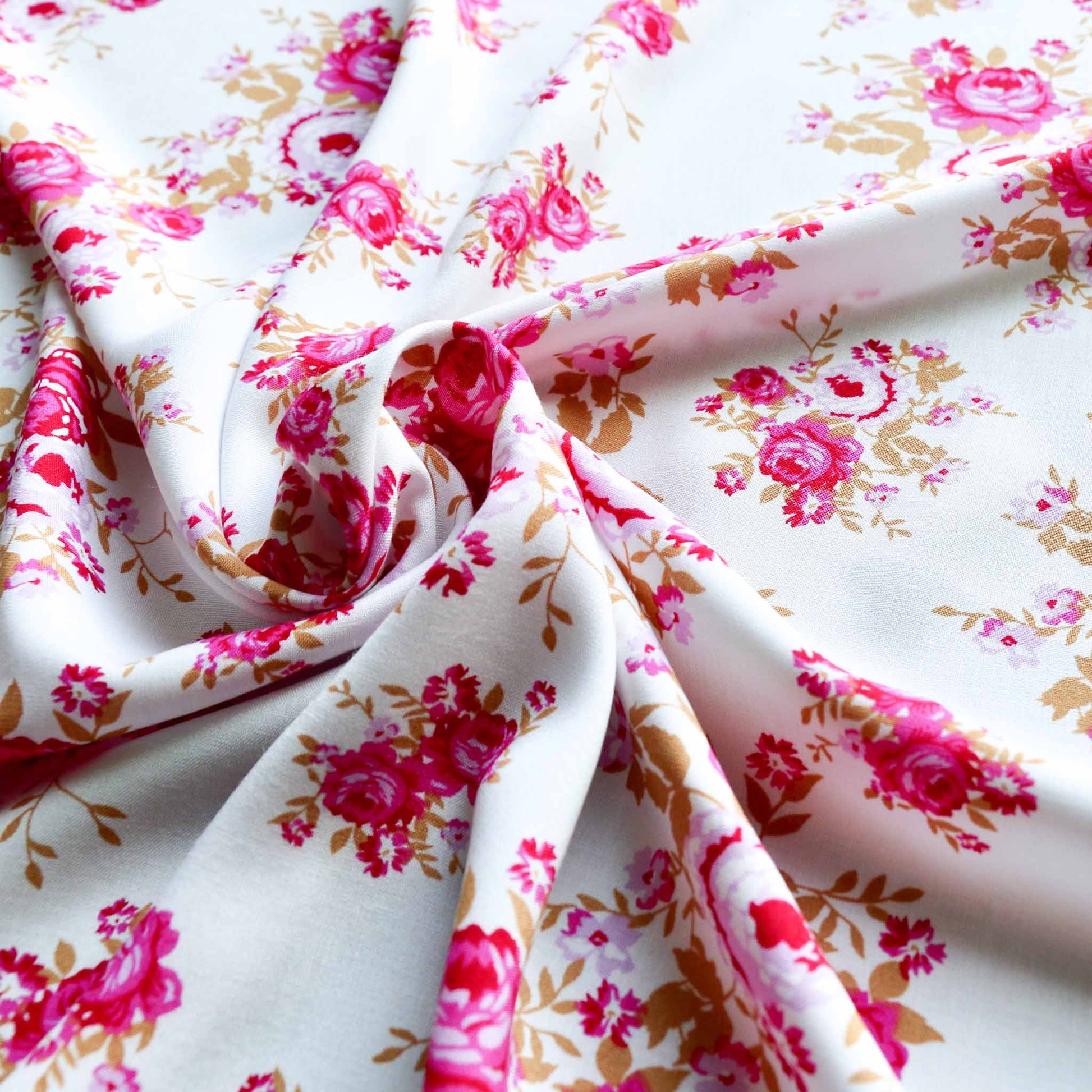 pink roses on white viscose challis dressmaking rayon floral fabric