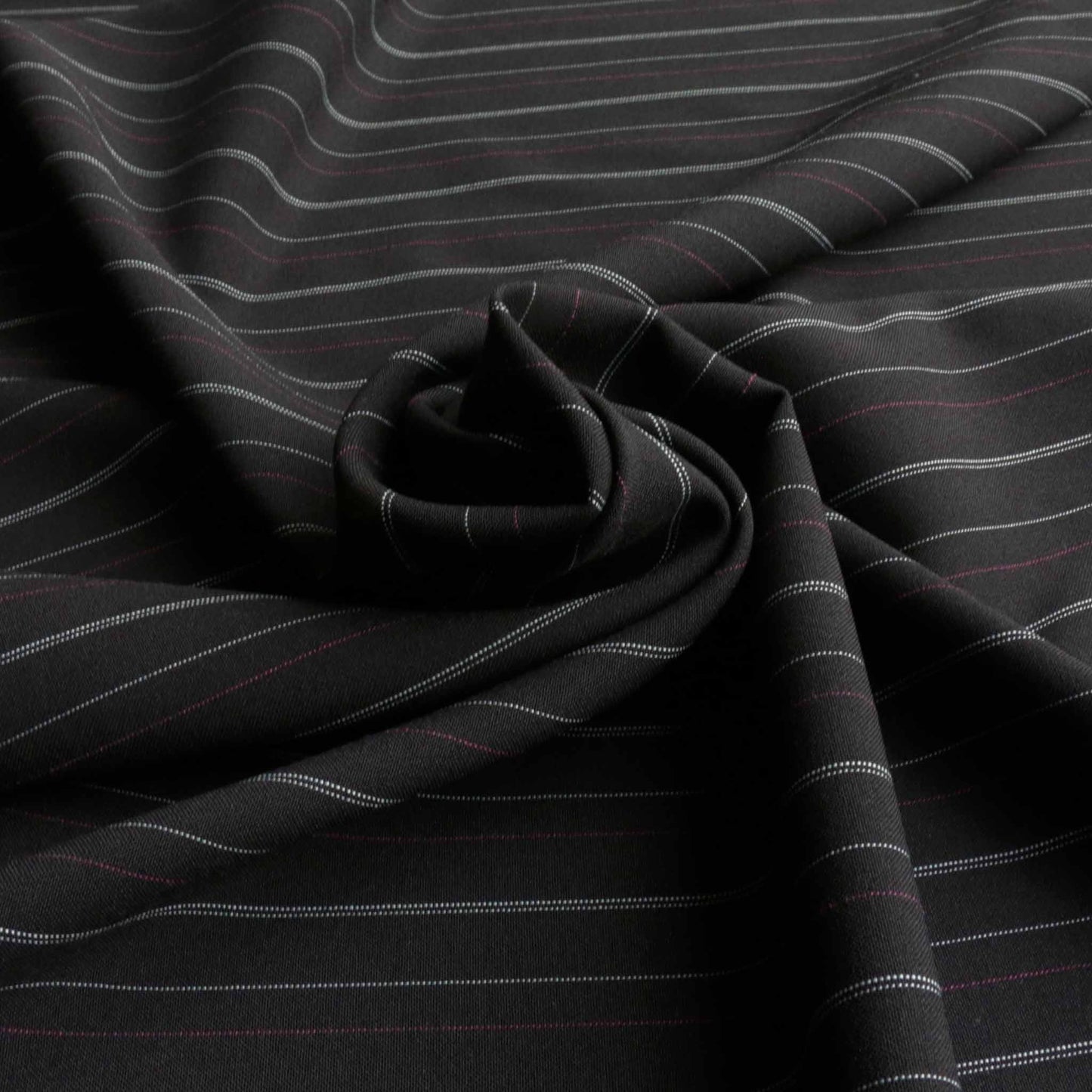 white and pink pinstripe suiting fabric in black