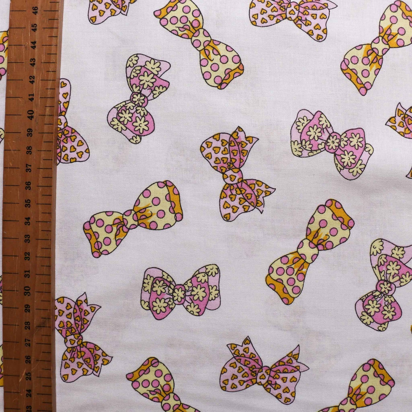 metre deadstock cotton dressmaking fabric from cloth control with polka dot tie design
