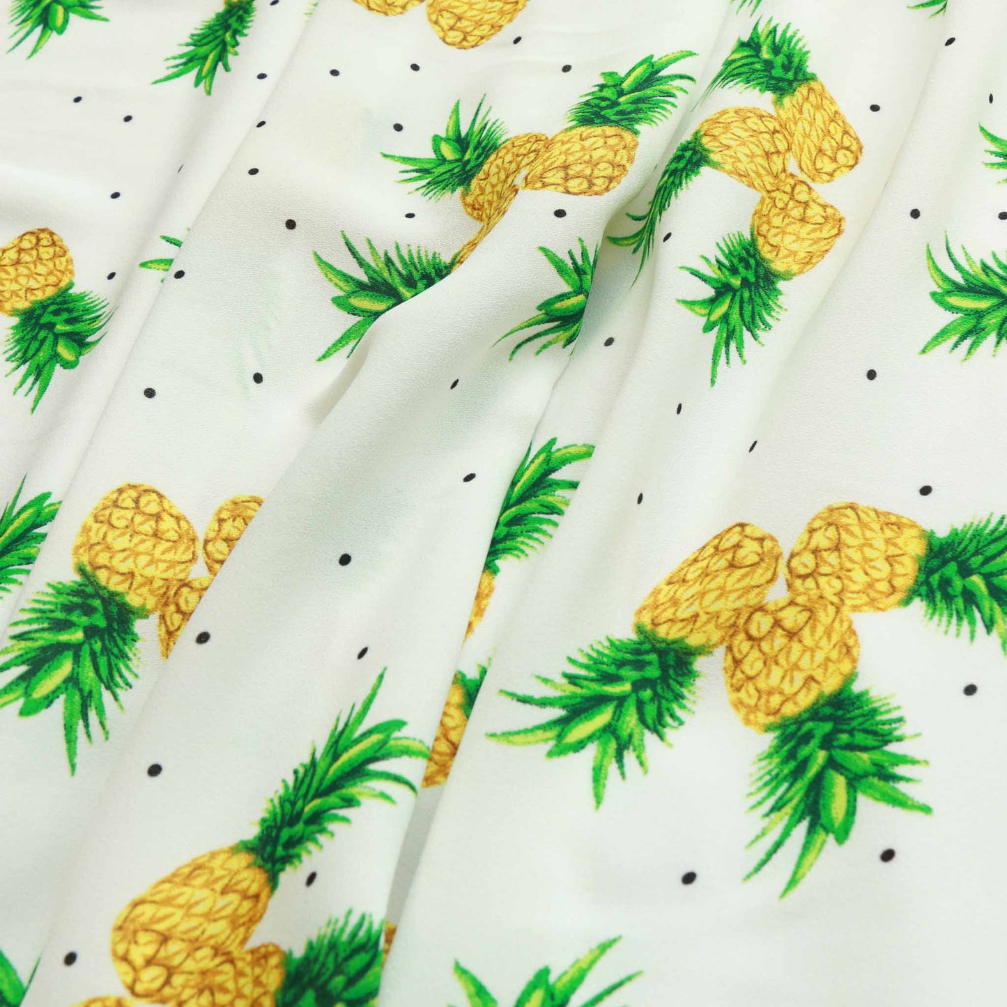 tropical white georgette dressmaking fabric with pineapple print