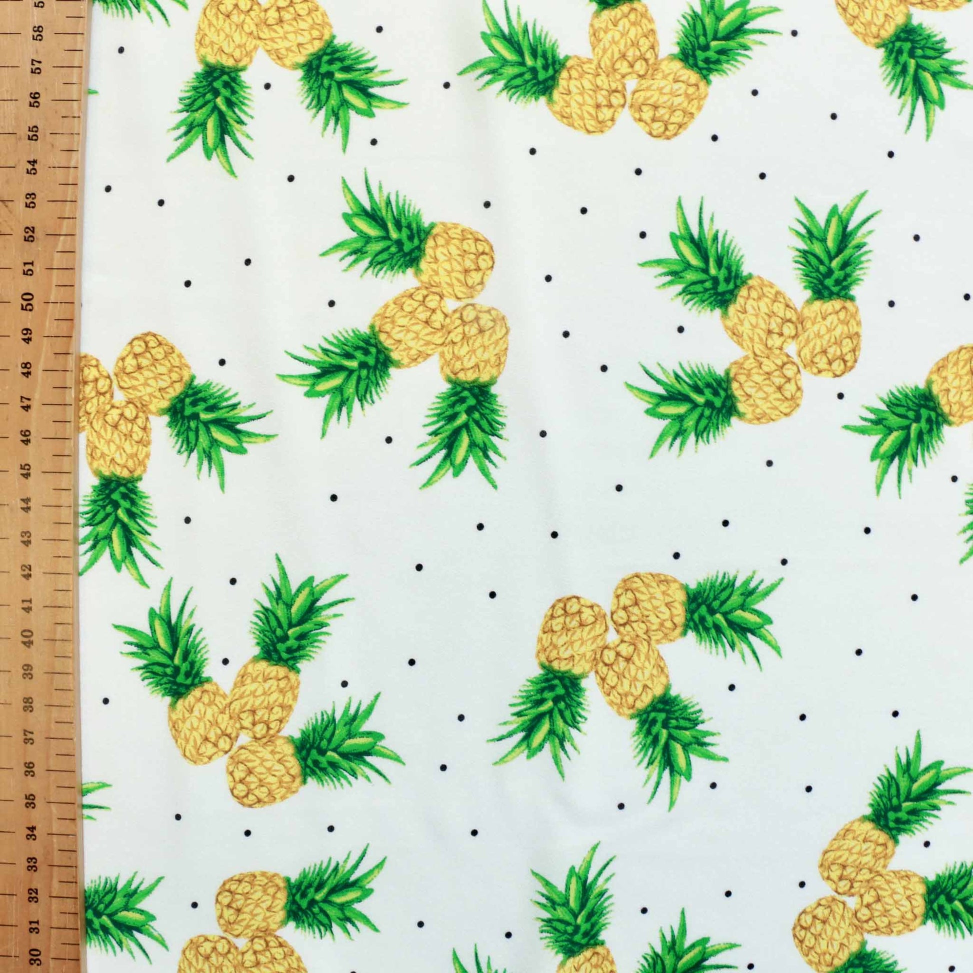 metre white georgette dressmaking fabric with printed pineapples