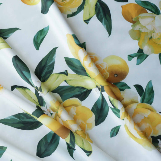 john kaldor designer jersey dressmaking fabric with large lemon print