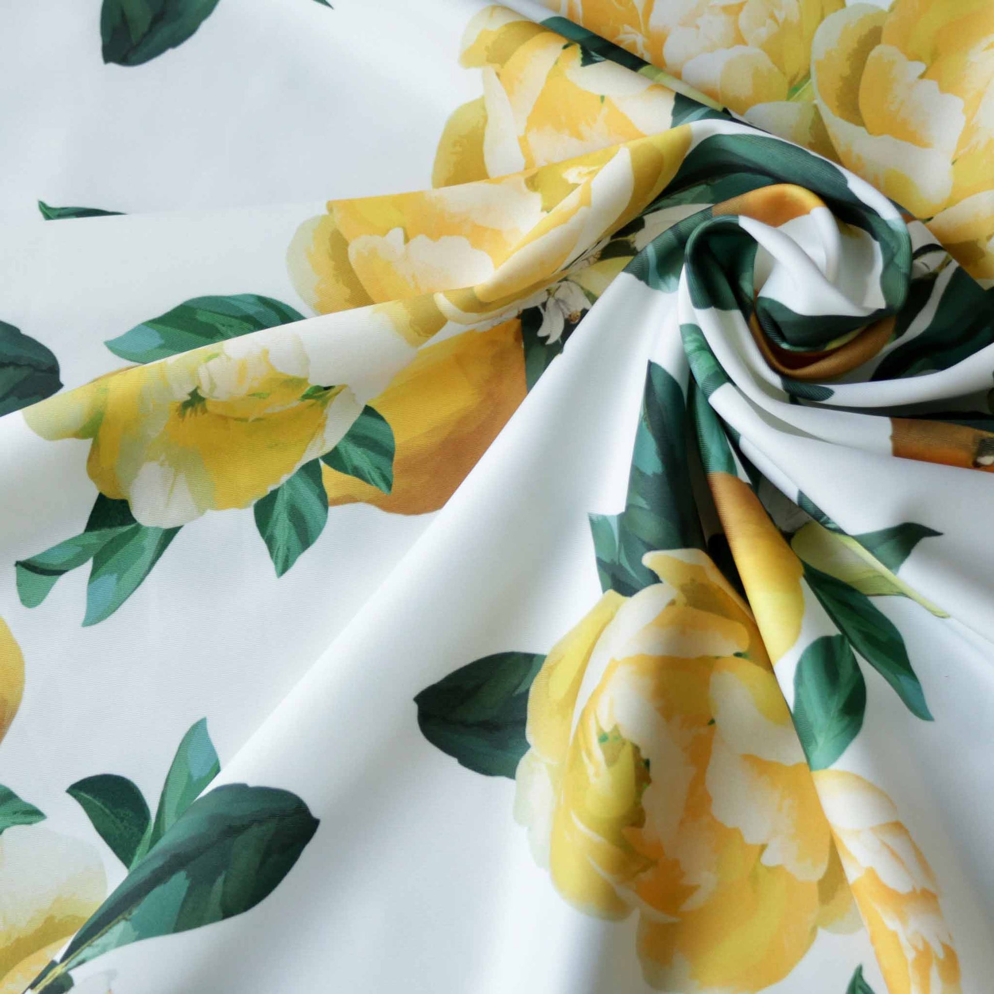 john kaldor large lemon printed white scuba jersey dressmaking fabric