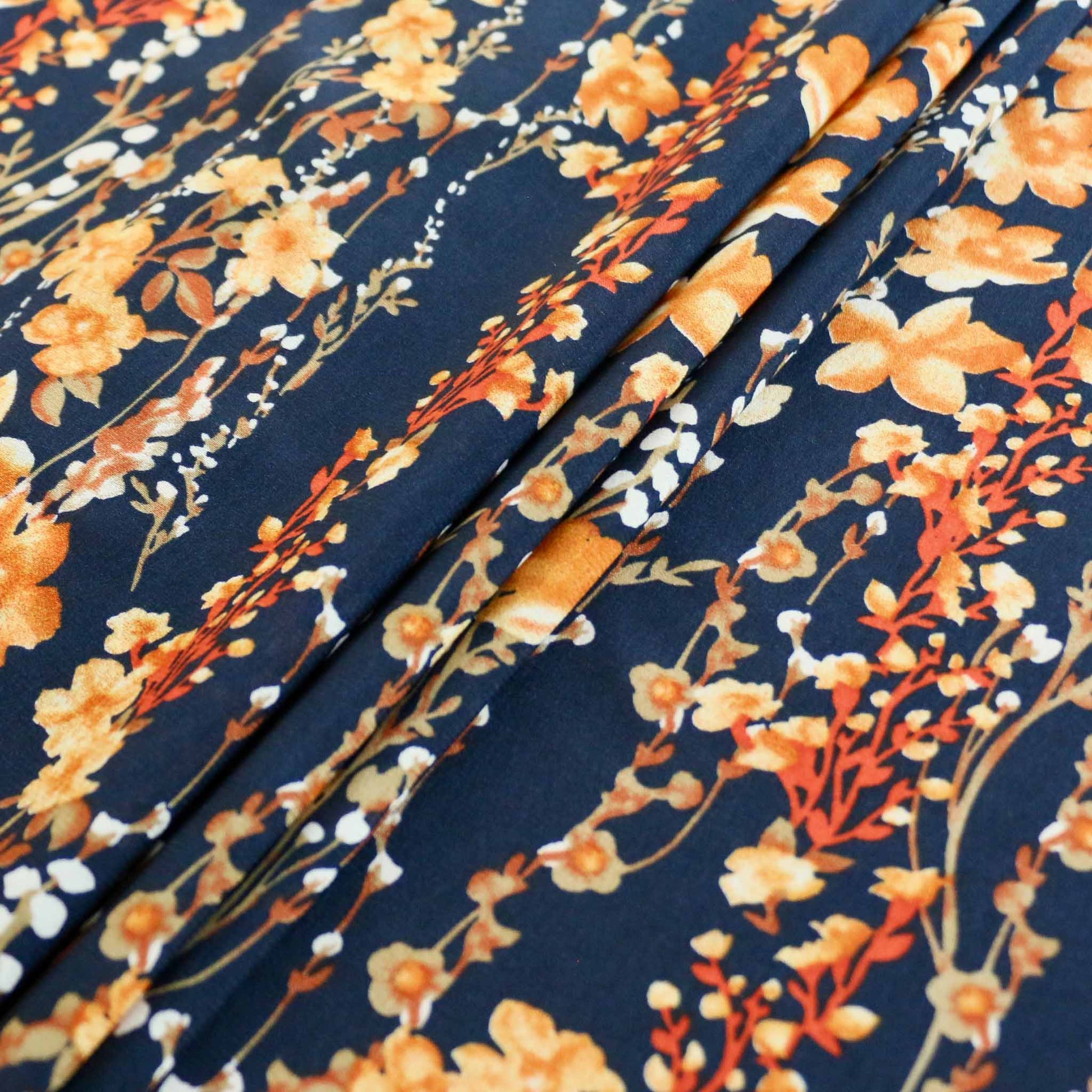 yellow and blue floral stretchy chiffon dressmaking fabric