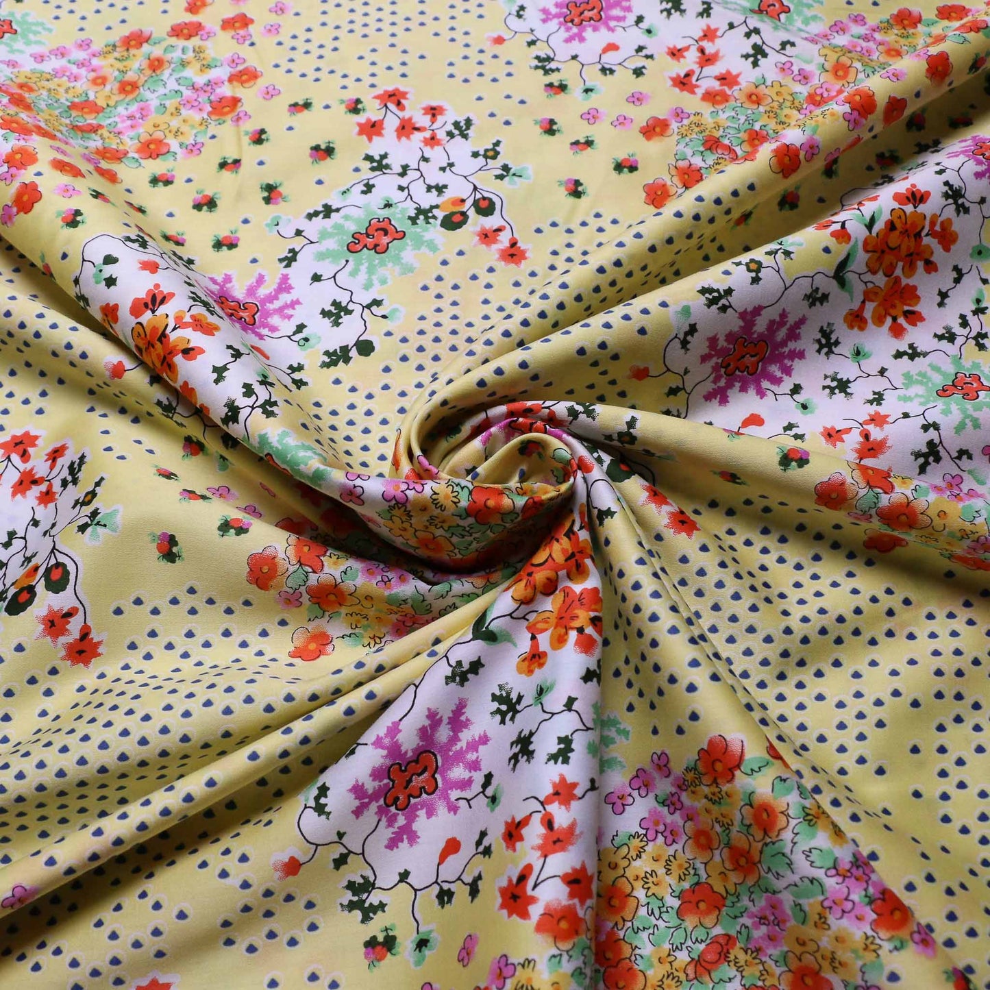 cotton lawn dressmaking fabric with multicoloured ditsy floral pattern
